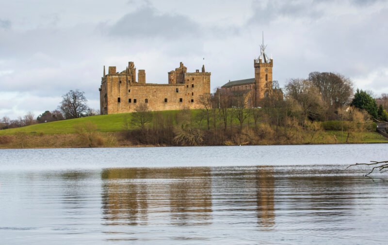 Linlithgow Palace and St Michaels Parish Church with its Distinctive Spire by Linlithgow Loch